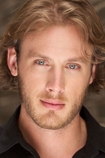 et billede af Topher Mikels