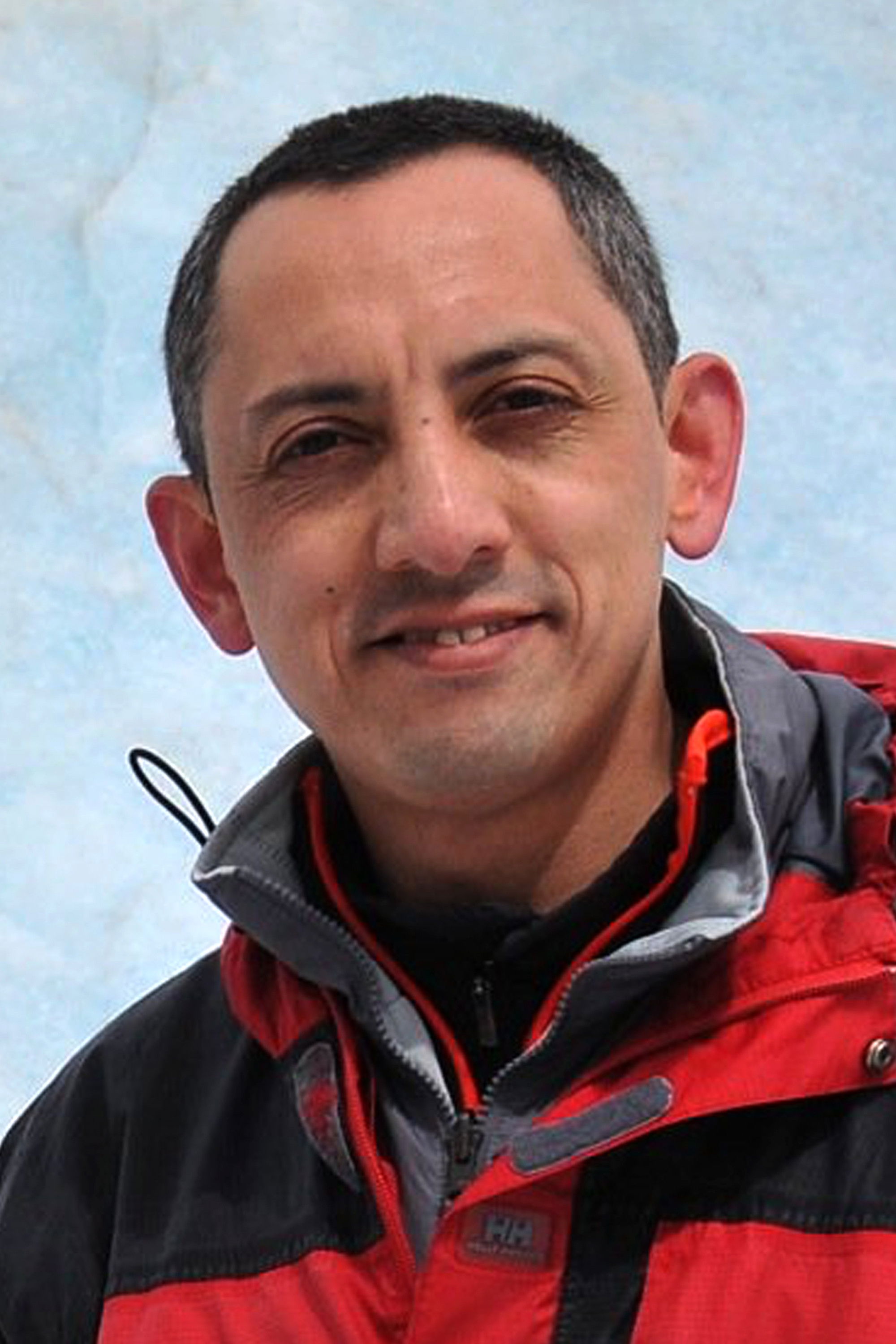 et billede af Arturo E. Quintana