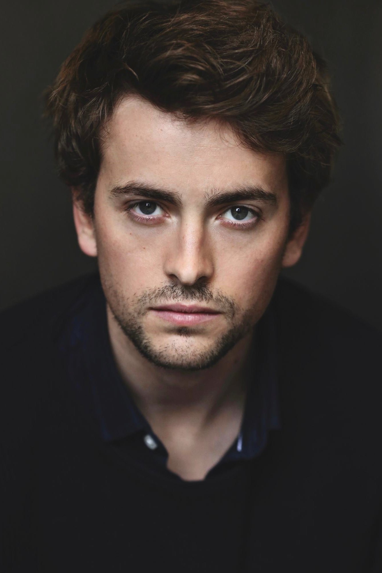 Tom England's picture in the cast