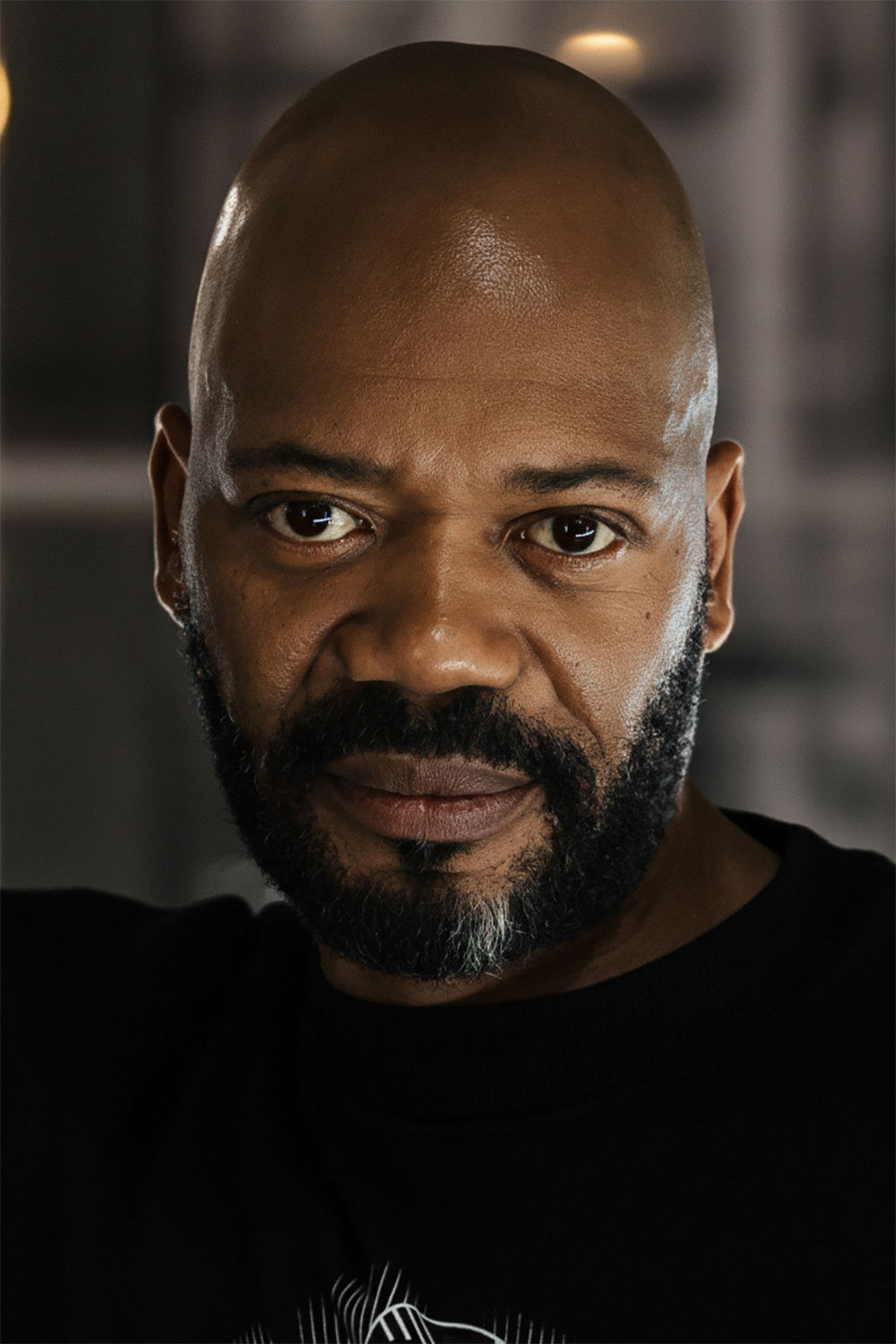 et billede af Claude Musungayi