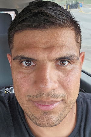 et billede af Helaman Olguin