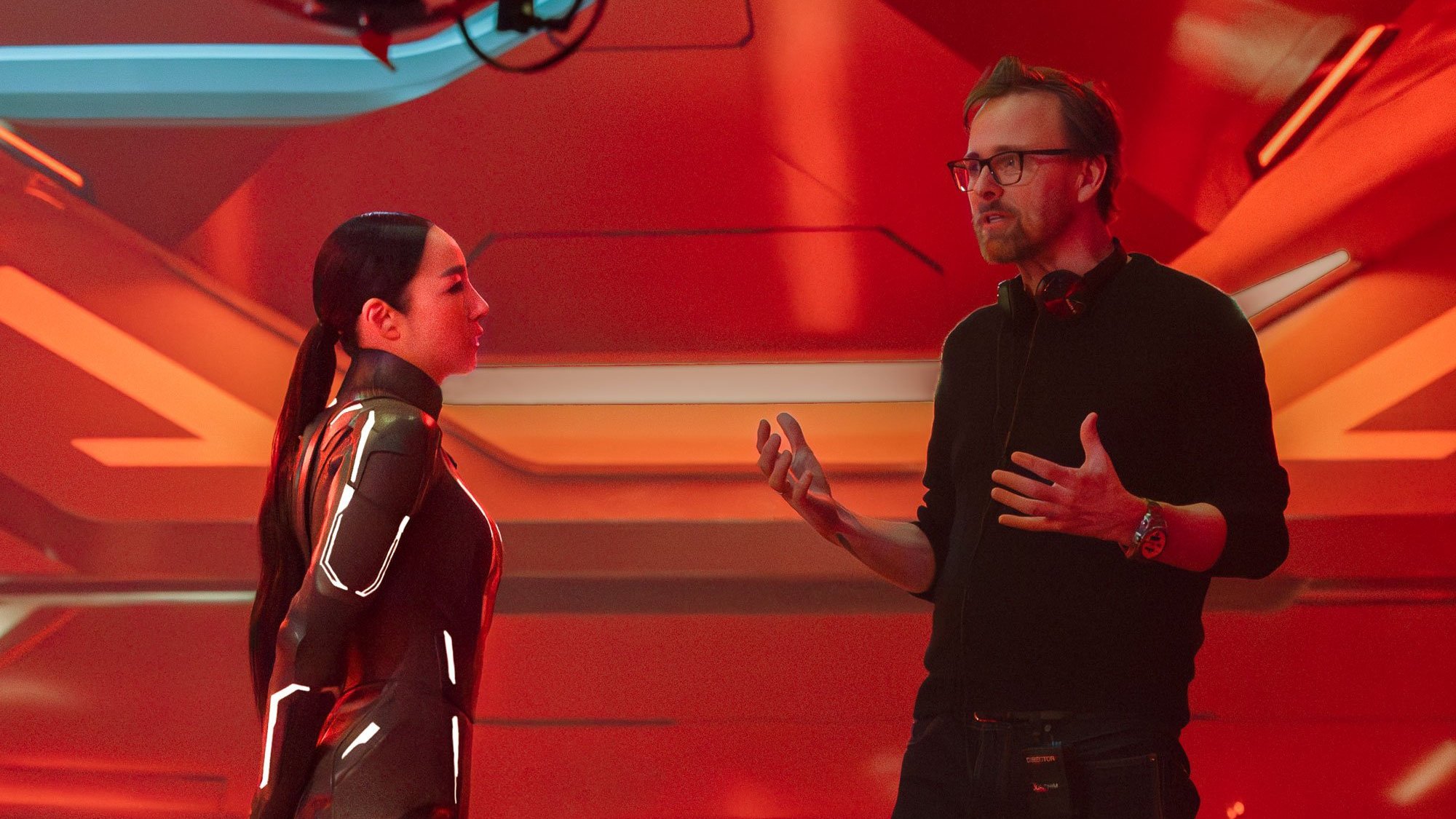 Caption: a man and a woman standing next to each other