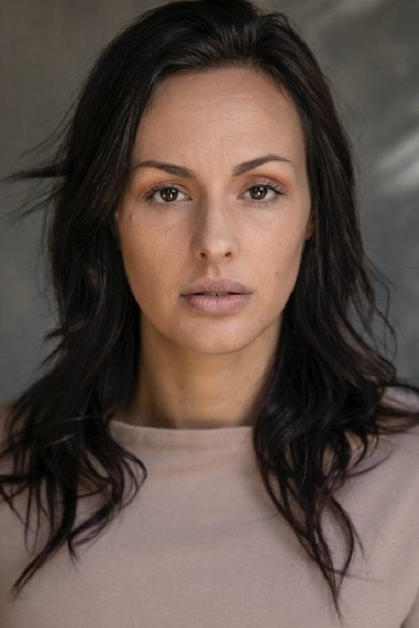 Astra McLaren's picture in the cast