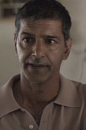 Richard Suliman | Motel Clerk