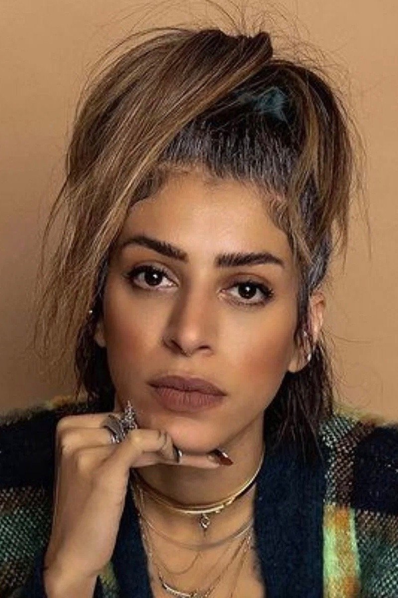 Ranin Karim's picture in the cast