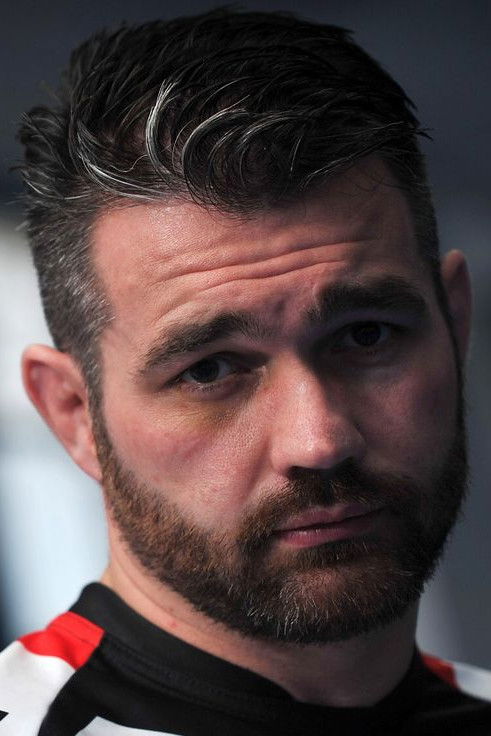 et billede af John Maguire