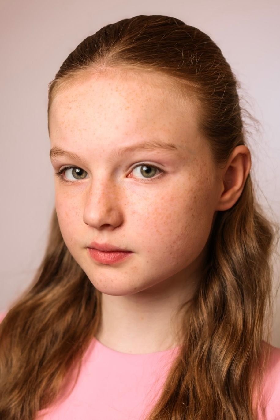 Molly McCann's picture in the cast