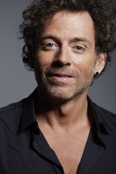 Santiago Ruiz's picture in the cast