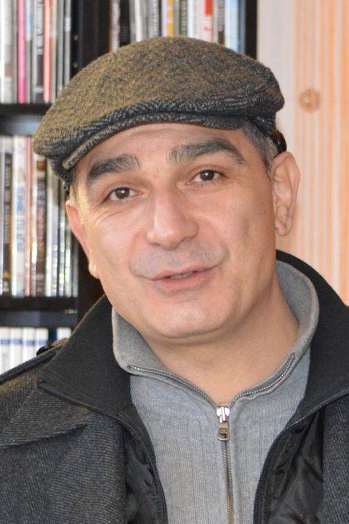 Lefteris Salomidis as Father Andreas