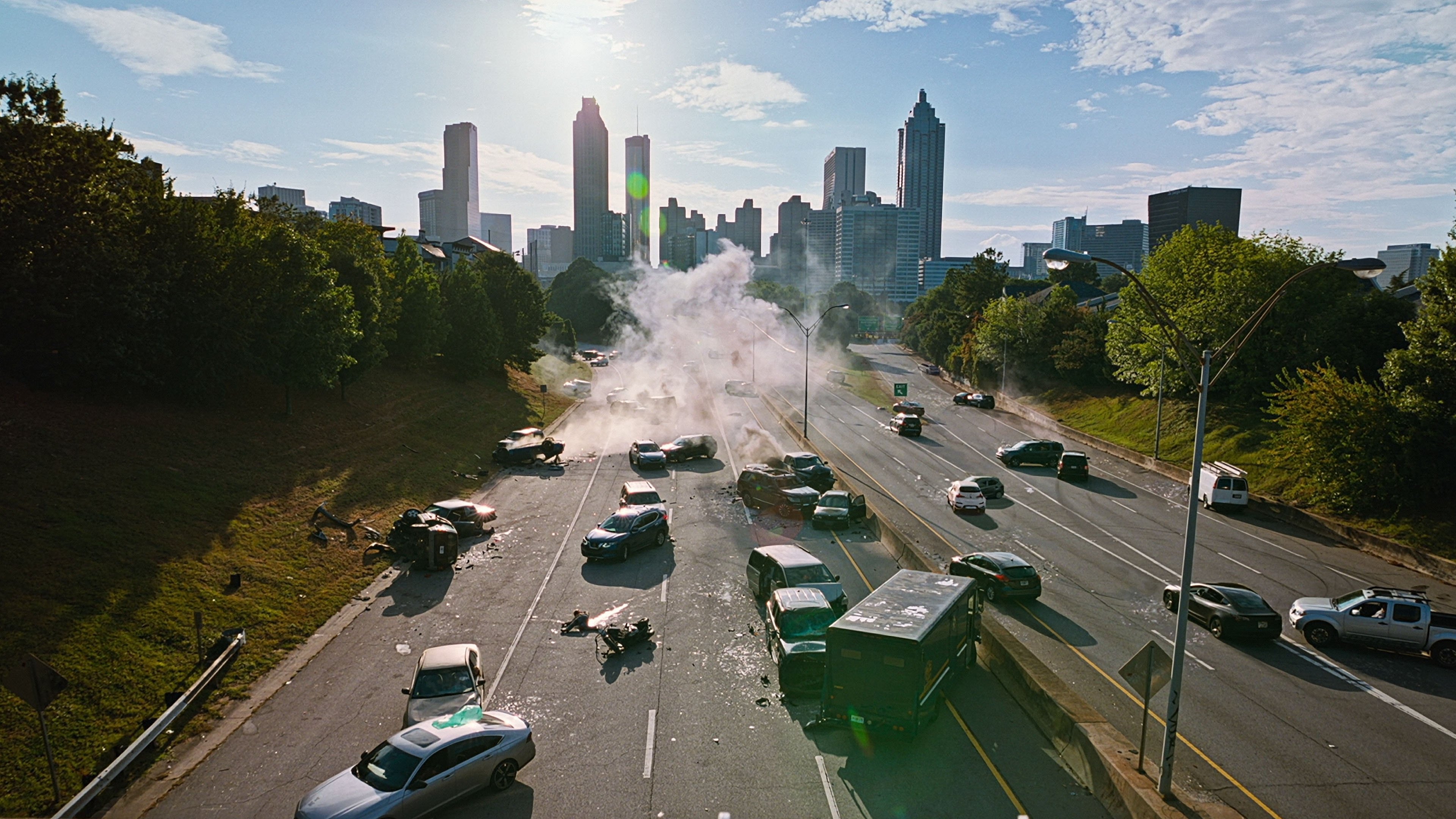 Caption: a city street filled with lots of traffic