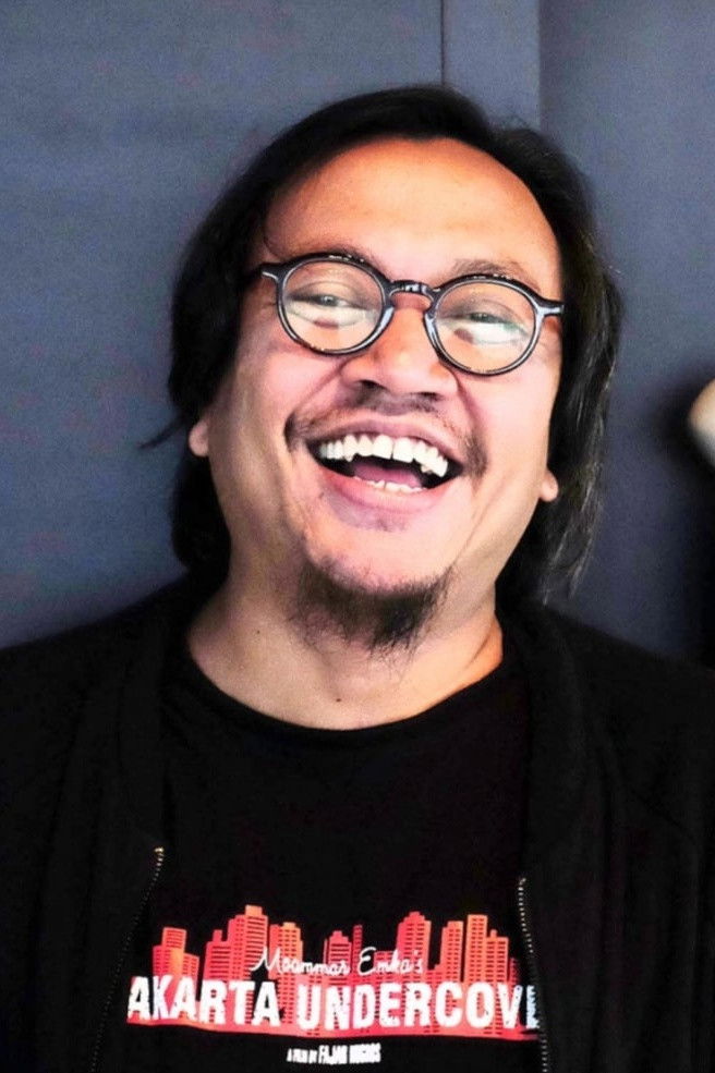 et billede af Moammar Emka