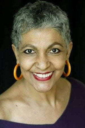 Profile Maria Alves with character Odete Profile Maria Alves with character Odete