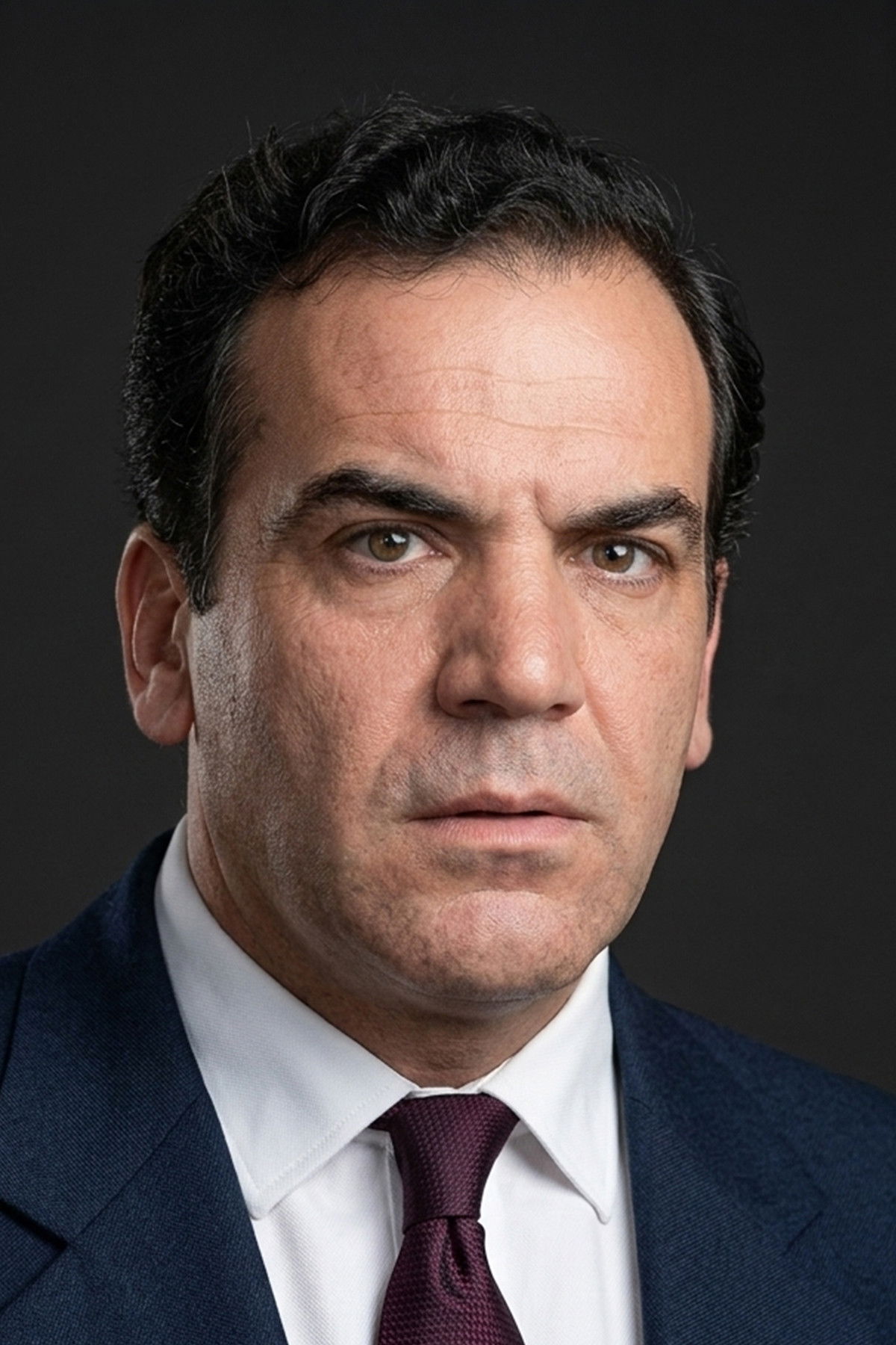 et billede af Osman Tuğaltay