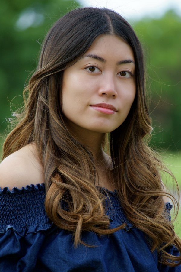 Angelica DeChavez as Catia's Friend / High School Student (uncredited)