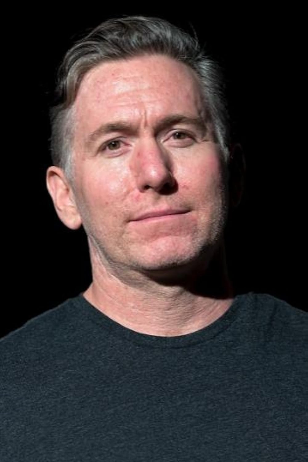 et billede af John Poston