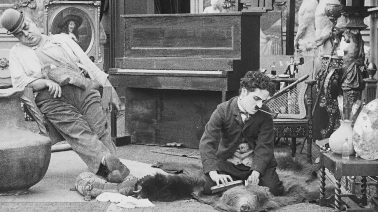 Behind the Screen (1916)