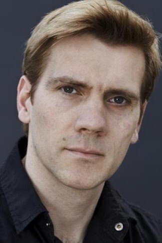 et billede af Adam Cooper