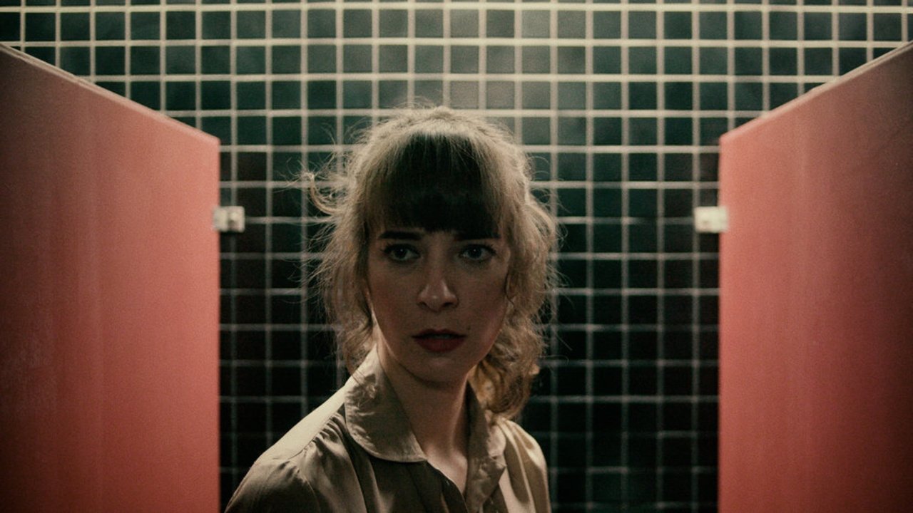 Woman in Stall (2018)