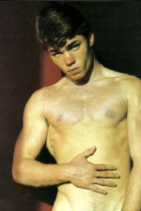 et billede af Brad Davis (80s)