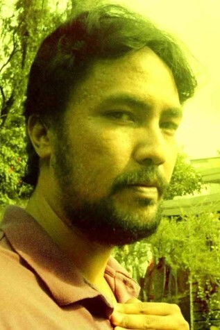 et billede af Abbo Q. Dela Cruz