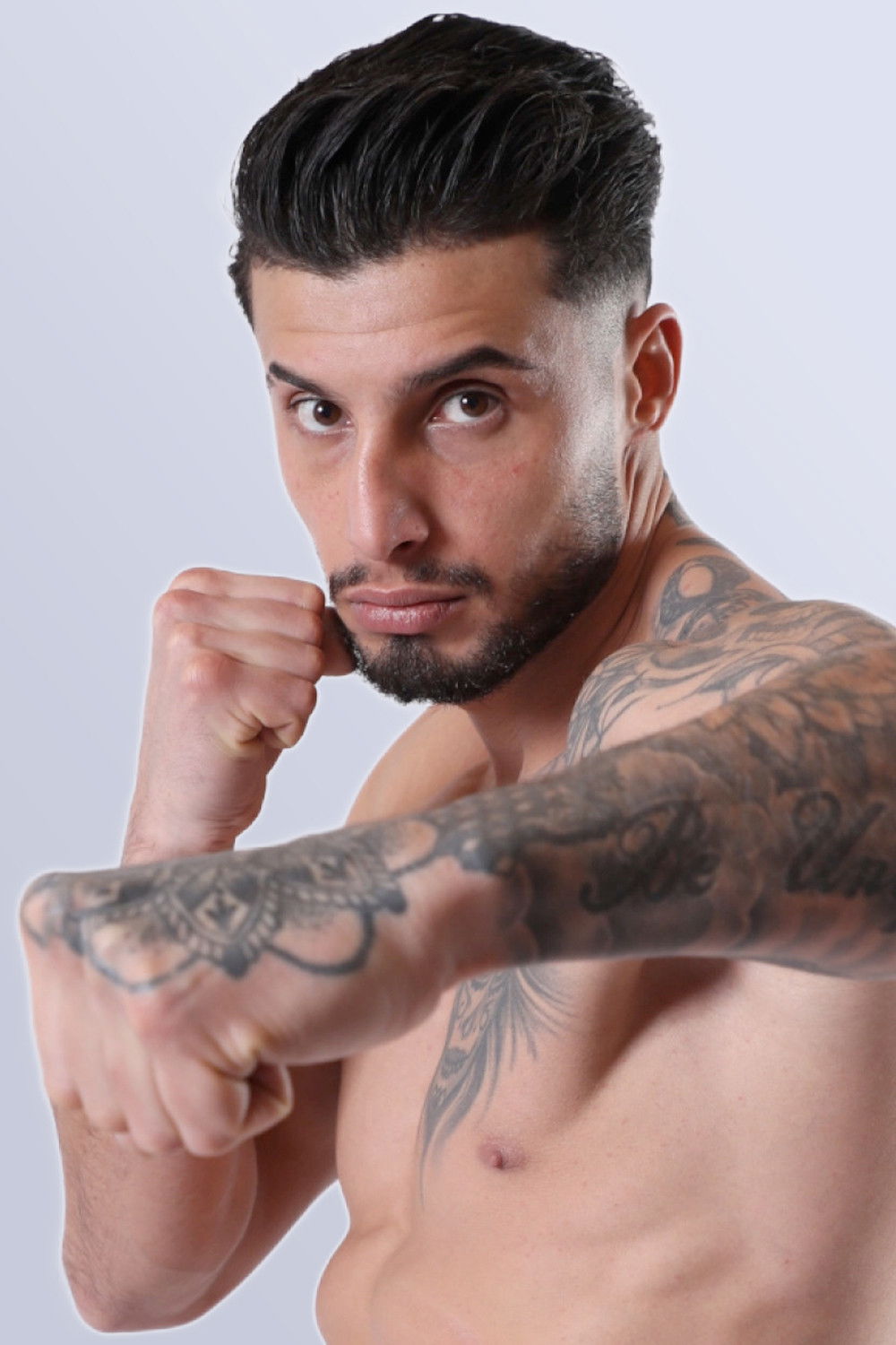 et billede af Hasan Toy