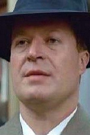 Pierre Decazes as Hotel Owner