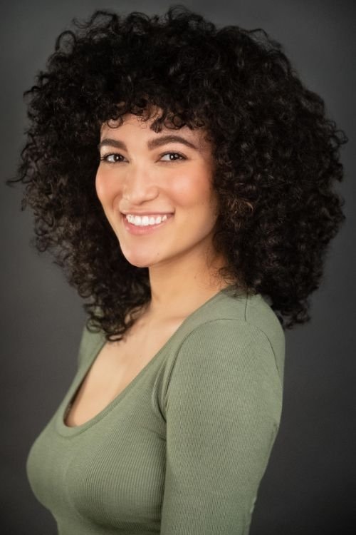 Madonna Gonzalez's picture in the cast