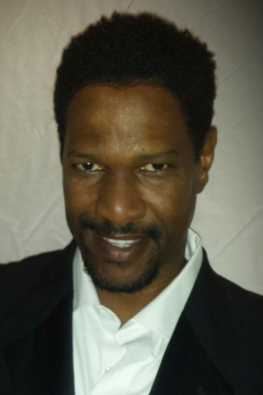 et billede af Malcolm X. Hughes