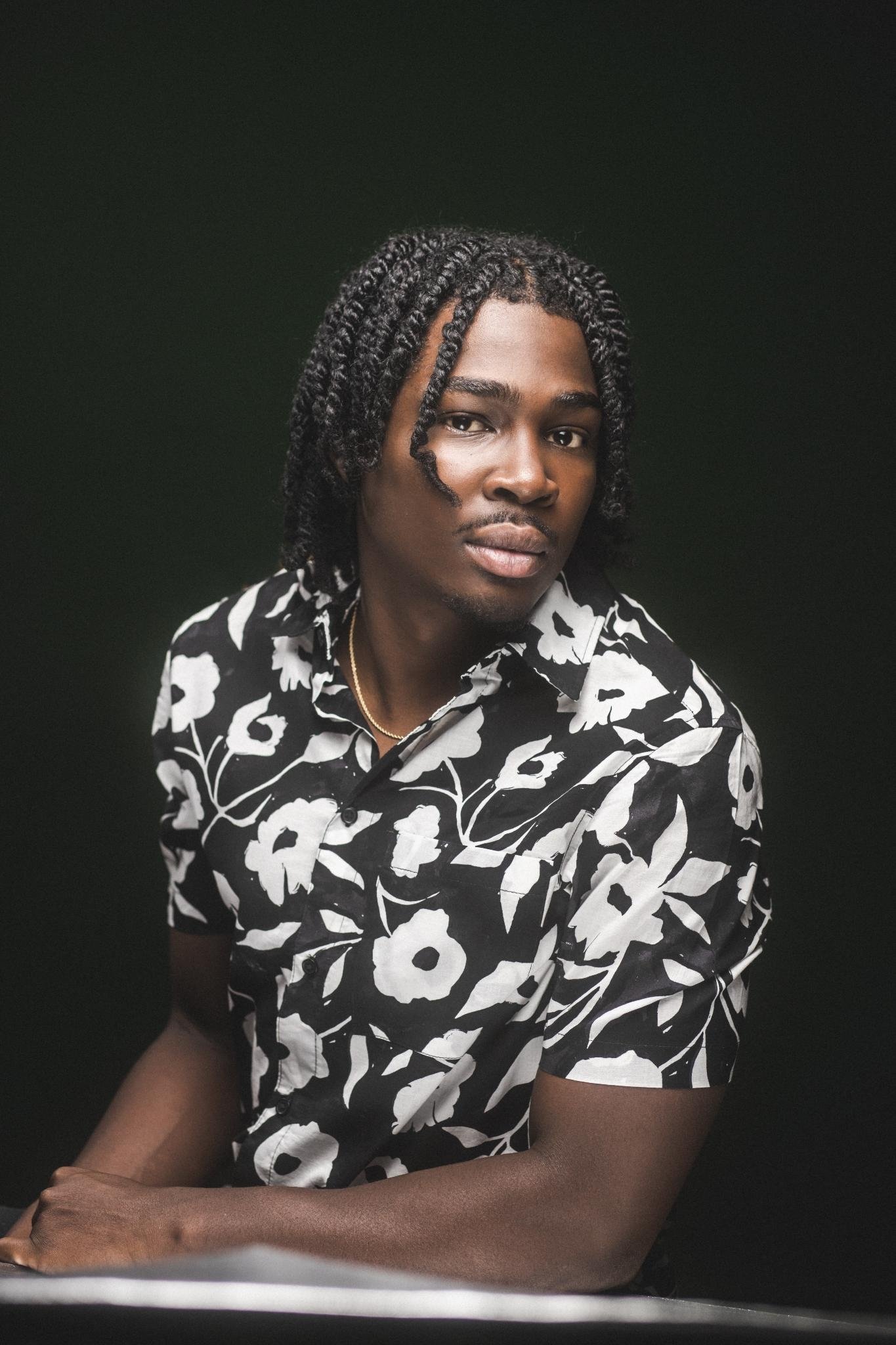 Kam Patterson's picture in the cast