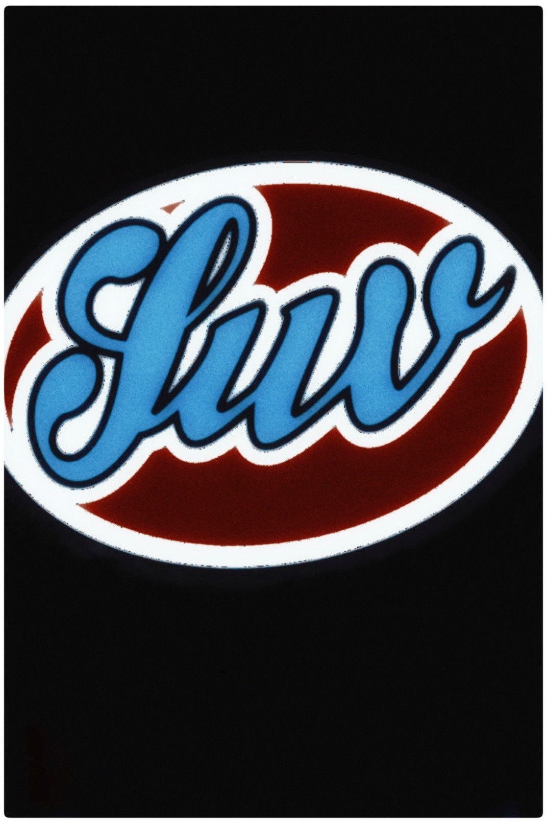 Plakat, der markedsfører Love Station