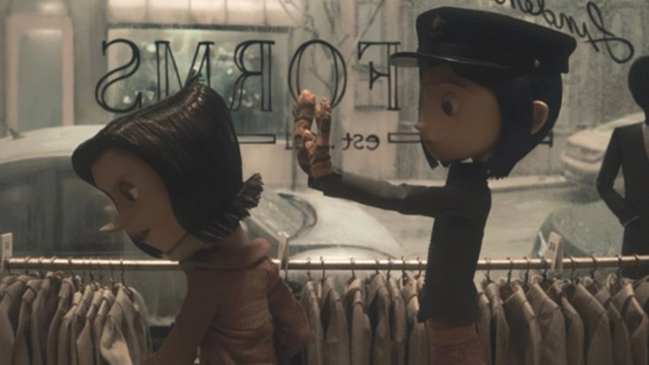 Caption: a couple of dolls standing next to each other