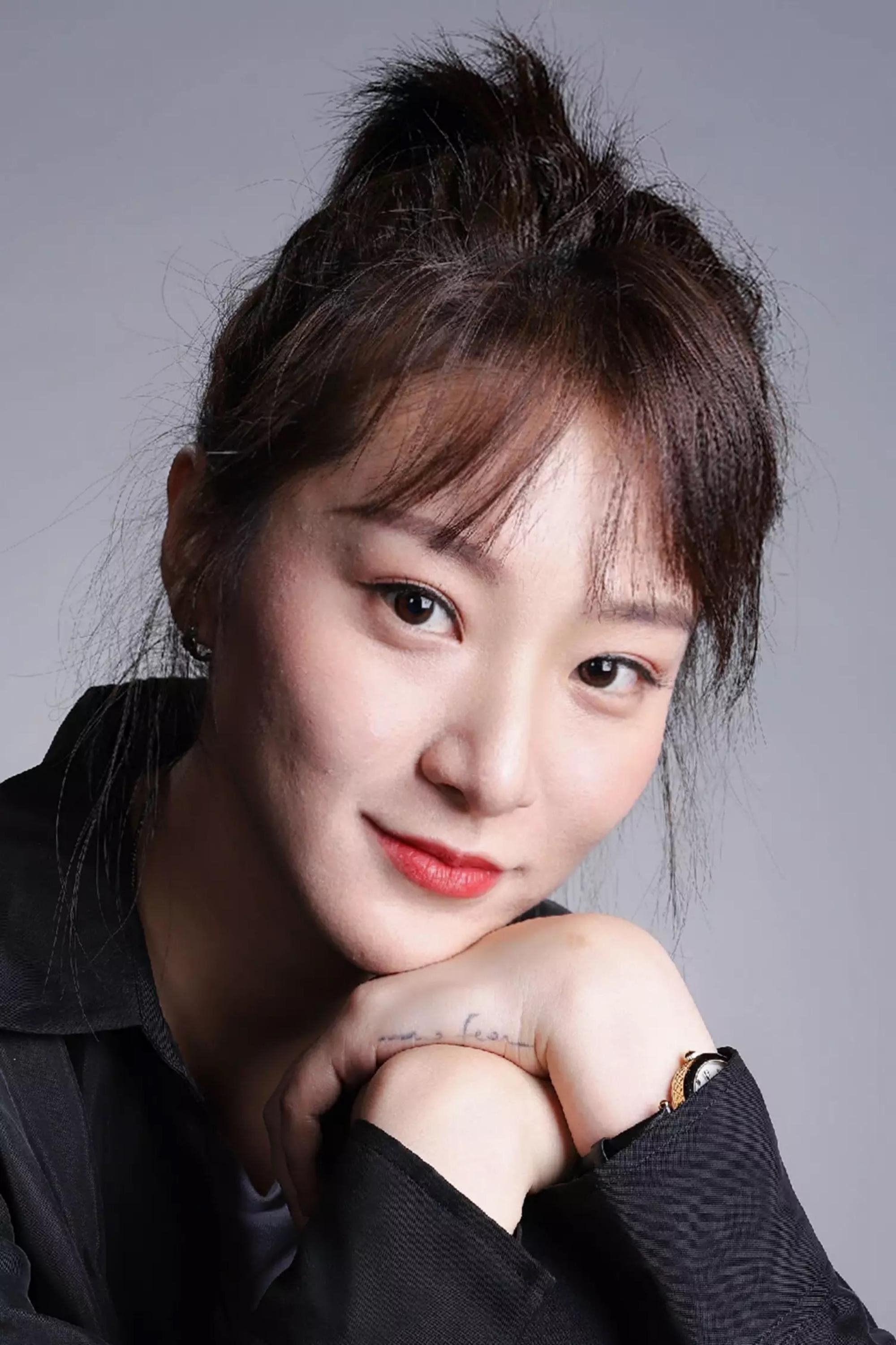 Qi Zhang's picture in the cast
