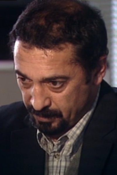 Yüksel Isik's picture in the cast