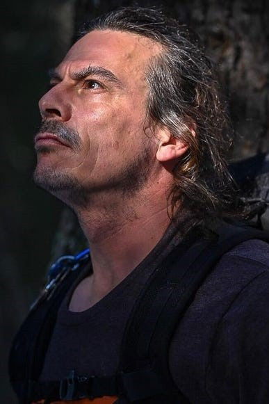 et billede af Alex De Sain