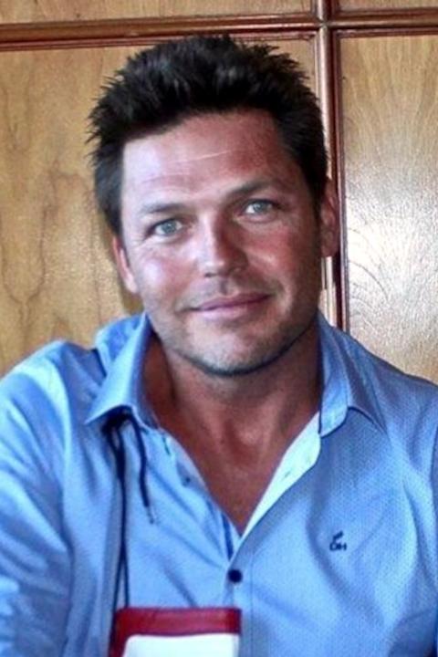 et billede af Brett Shuttleworth