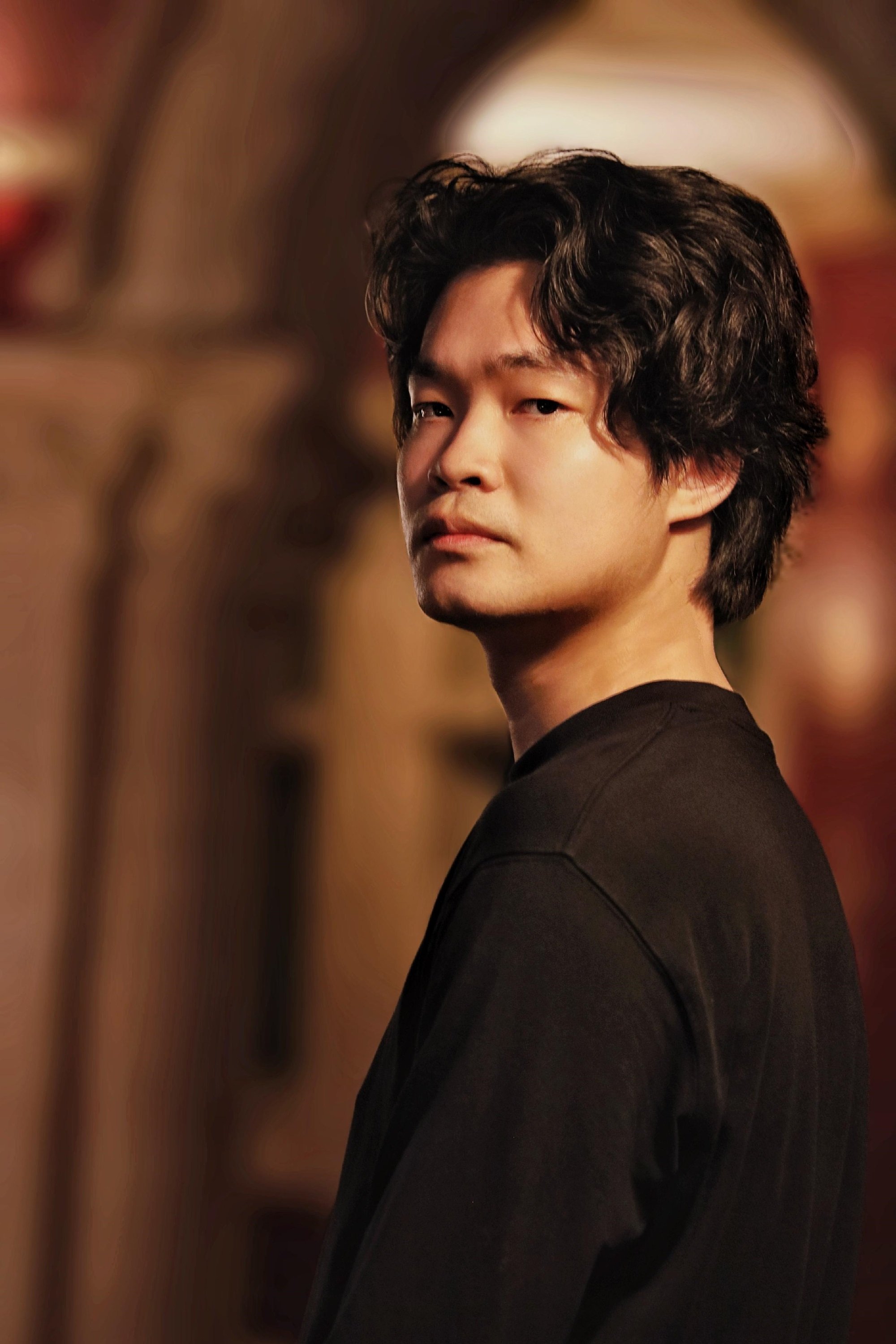 et billede af Charles A. Tam