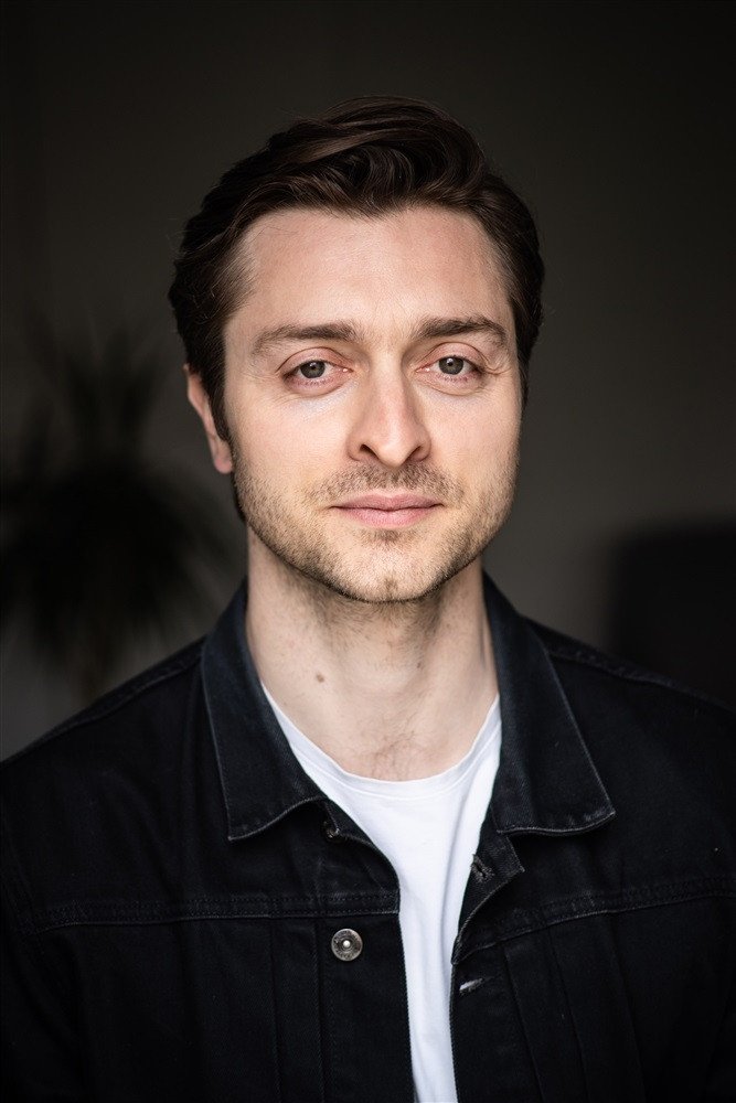 Simon Larvaron's picture in the cast