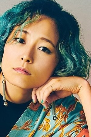 Motoko Kida as Guitar/Backing Vocals