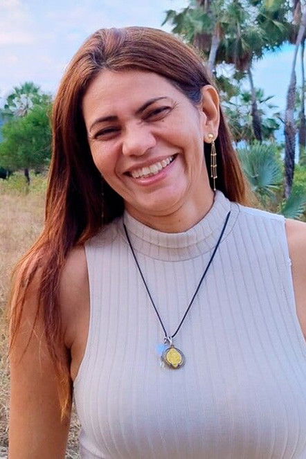 et billede af Dênia Cruz