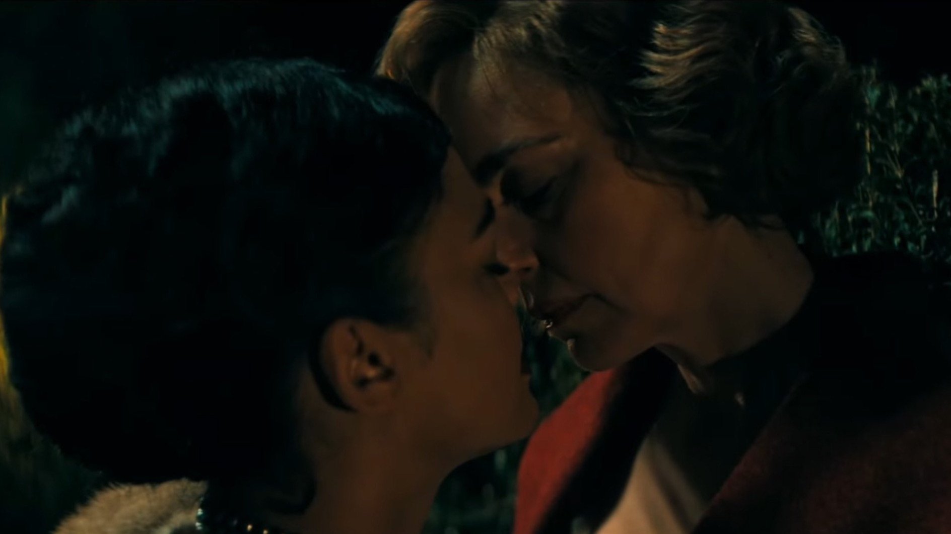 Caption: a couple of women standing next to each other