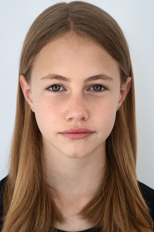 Cora Trube's picture in the cast