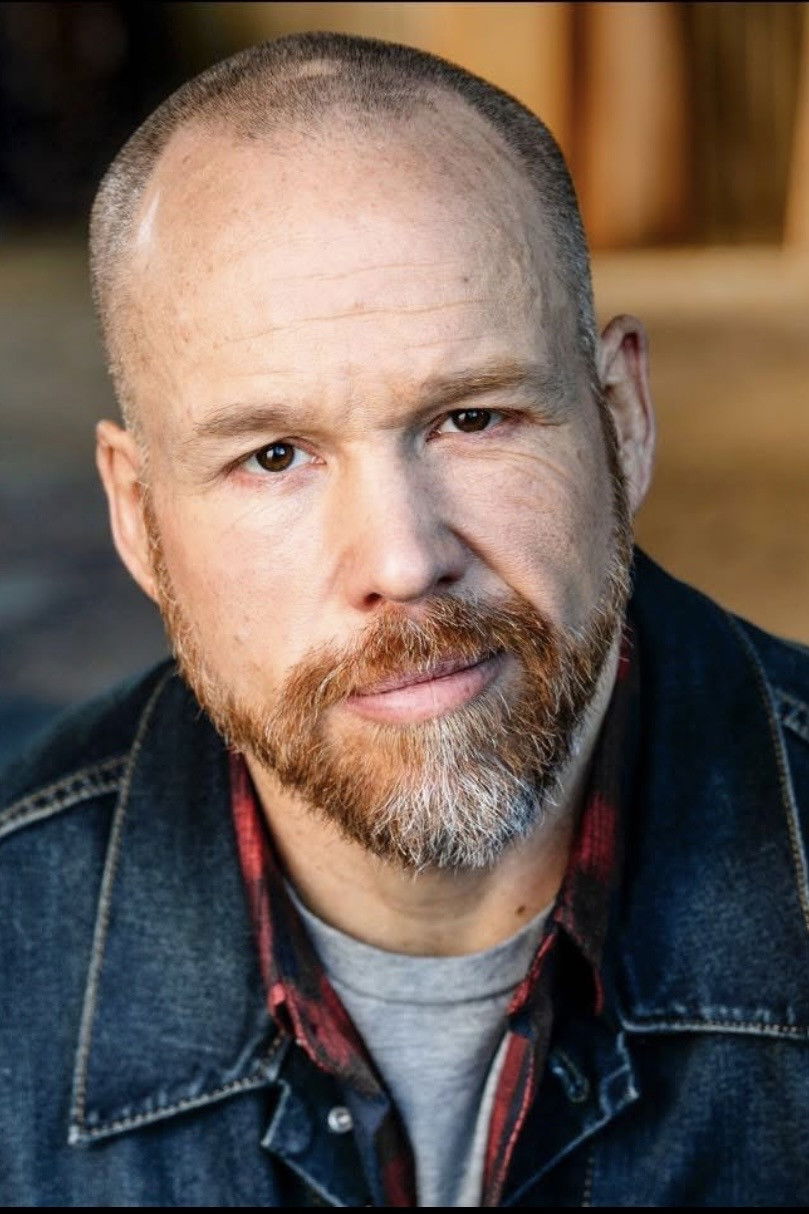 et billede af John Basler