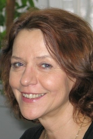 Iwona Głębicka as Photo Store Clerk