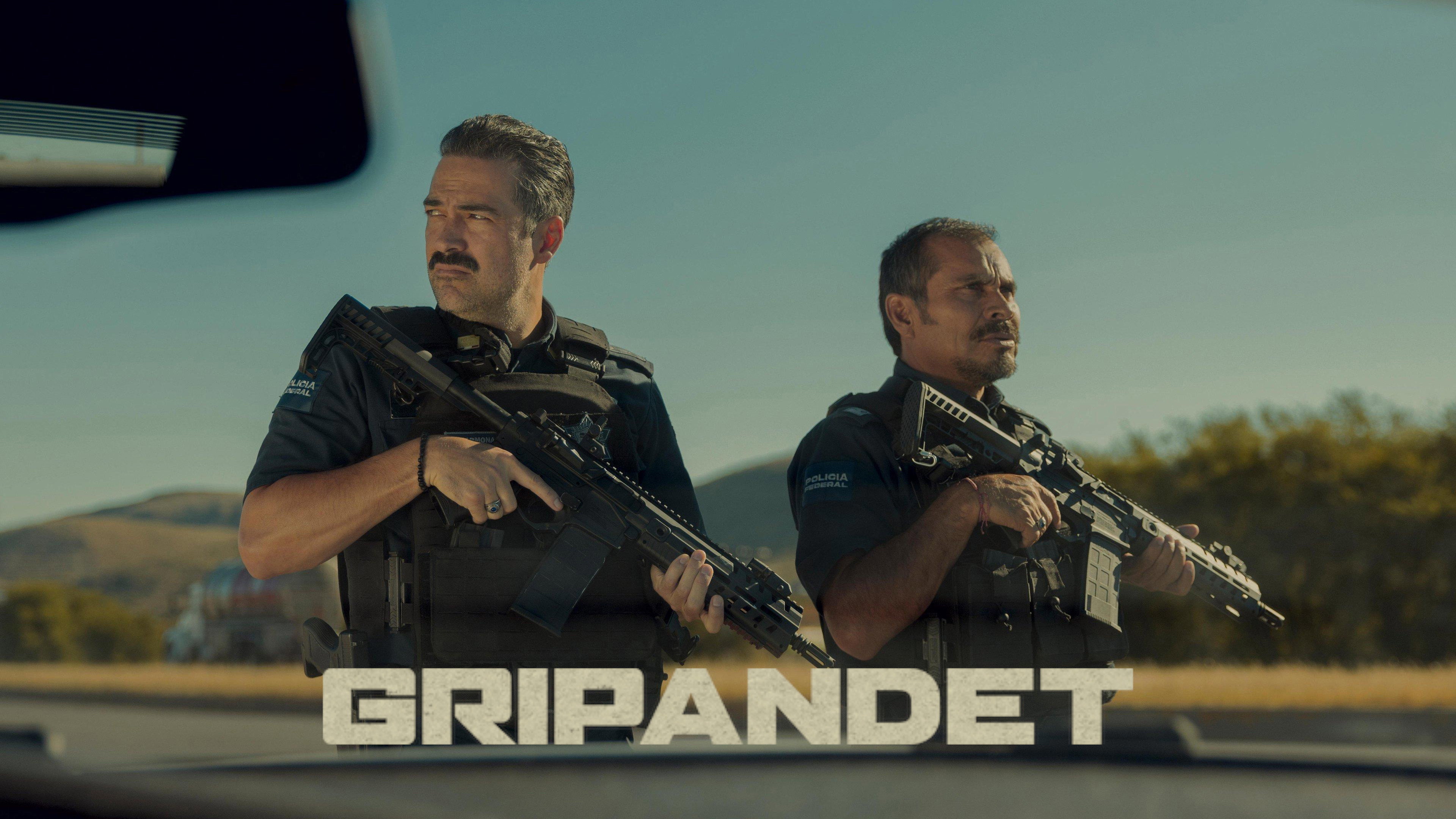 Facing El Chapo backdrop