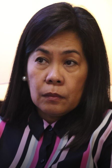 Mel Mendoza-Del Rosario backdrop
