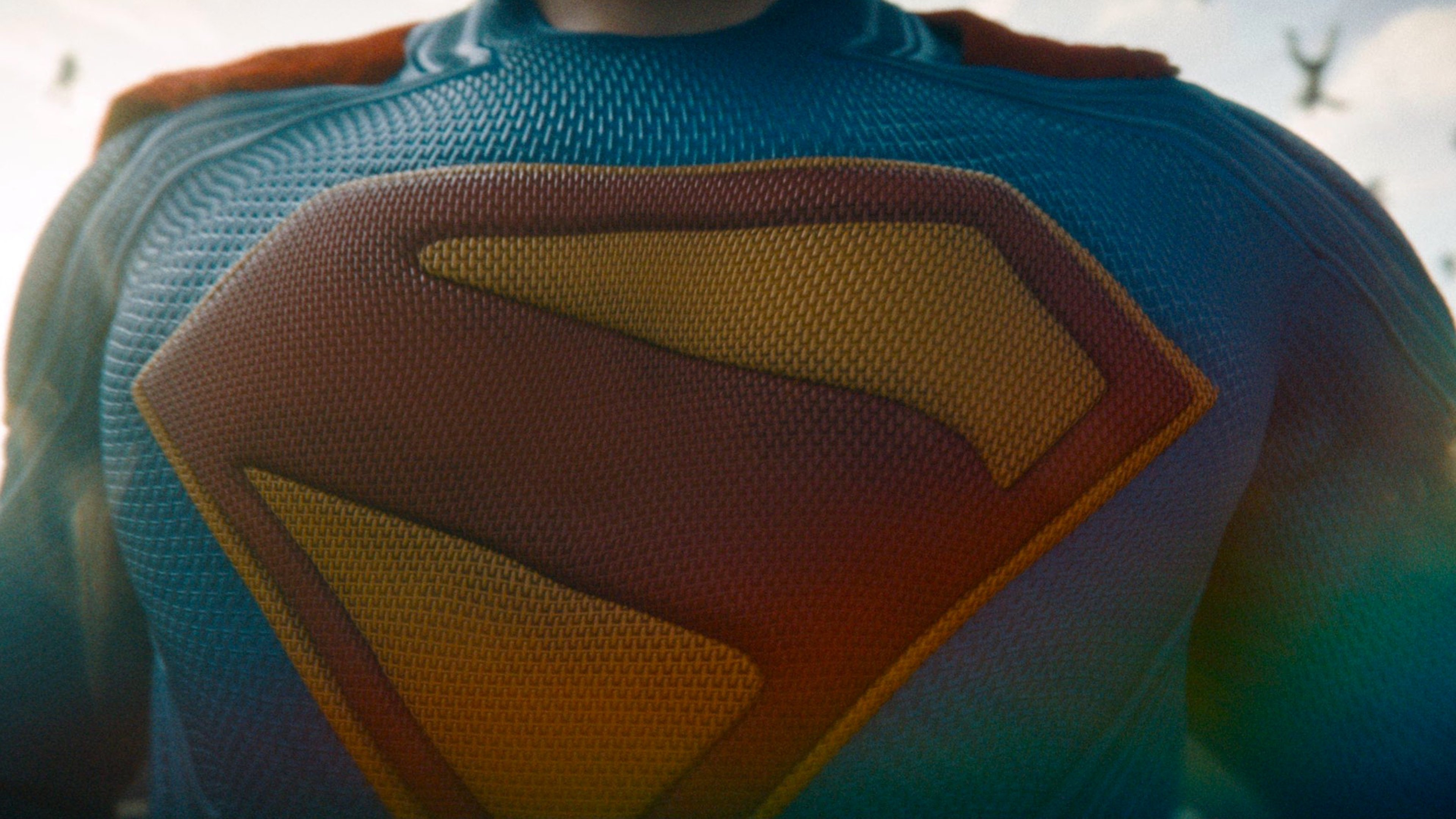 Caption: a close up of a superman movie costume