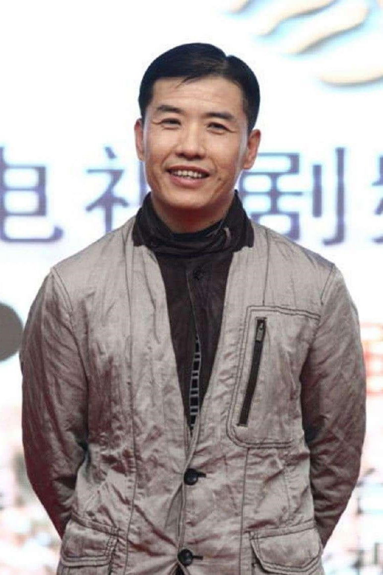 et billede af Xiaoping Guan