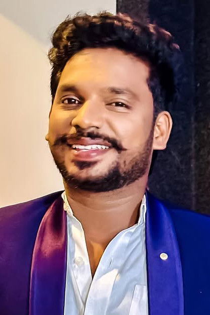 et billede af Nanjil Vijayan