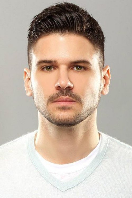 et billede af Tolgahan Sayışman