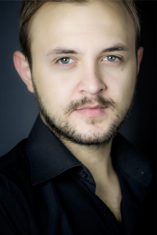 et billede af Muammer Tali